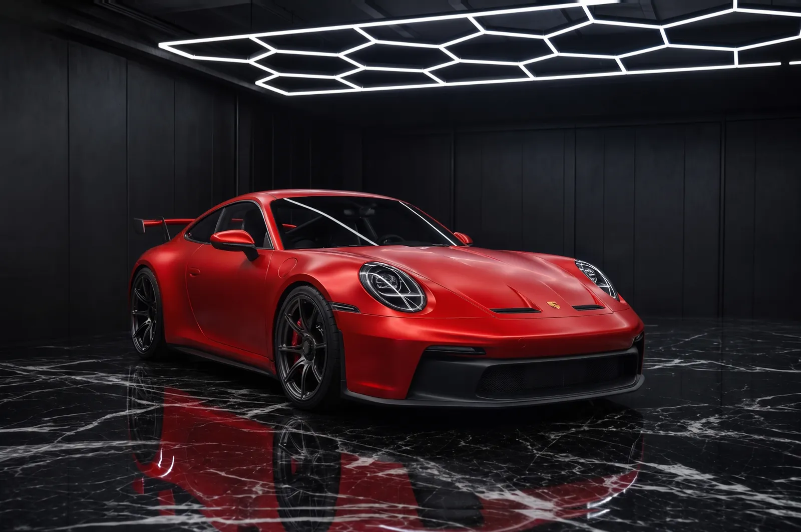 The same Porsche 911 GT3 in satin stealth paint protection film