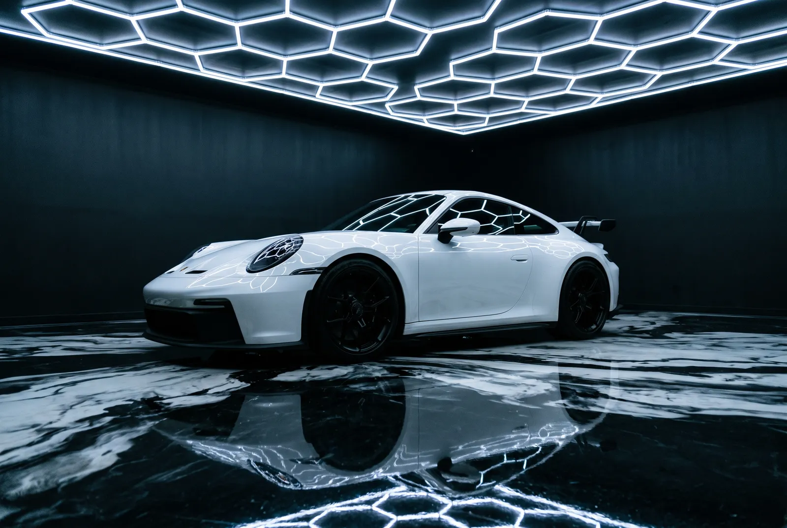 A white Porsche 911 GT3